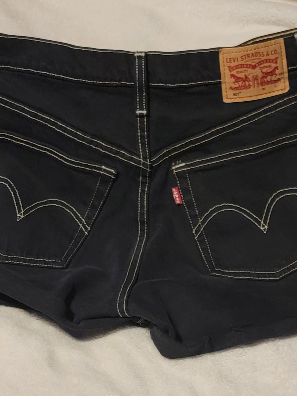 Levi's Women's Black Denim Shorts - Classic Back Pocket Design
